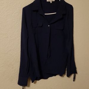 Buttoned up blue blouse